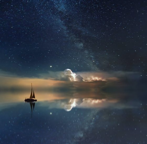 Sailboat sailing into the dark clouds at night - More Human Navigation